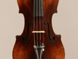 a close up of a violin with a bow on a white background