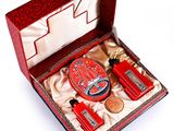 a red box with a lot of items inside of it