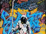 tableau représentant un homme debout devant un mur recouvert de graffitis