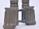 a pair of binoculars that are sitting on a table