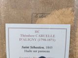 a plaque on the back of a suitcase with a picture of a man