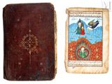 un vieux livre sur lequel figure l'image d'une femme et d'un oiseau