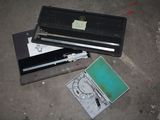 a broken laptop and other electronic equipment on the ground