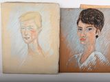 two paintings of a woman and a man are on a table
