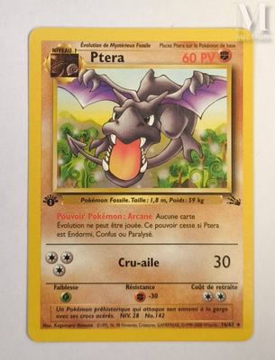 a close up of a pokemon card on a white surface