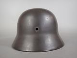 an image of a helmet with a hole in the middle of it