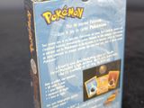 a box of pokemon cards sitting on a table