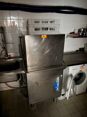 a washer and a dryer in a small kitchen