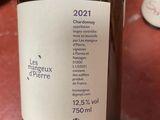 a bottle of wine that is sitting on a table