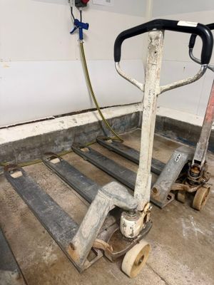 a hand truck that is sitting in the garage