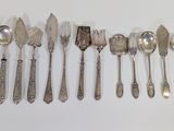 a lot of spoons and spoon spoons on the table