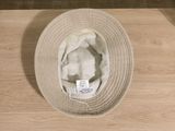 a hat that is sitting on a wooden table