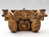 an image of a group of carved animals sitting on top of each other