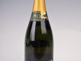 an image of a bottle of champagne on a white surface