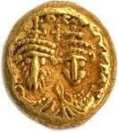 une pièce d'or portant l'image d'un homme