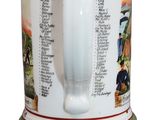 a beer mug with a handle that has a picture of people on it