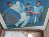 a box with a picture of a man playing golf inside of it