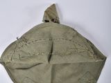 an image of a green bag with a bird on it