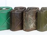 four green and brown jerry cans lined up in a row