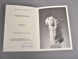 a book with a picture of a male torso on it