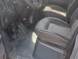 a car that has a steering wheel and a seat in it