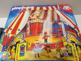 a box of playmobil with a circus scene on it