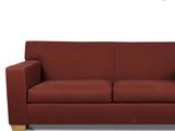 an image of a red couch sitting on top of a white floor