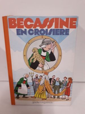 un livre sur lequel figure la photo d'un homme en costume et d'une femme en robe