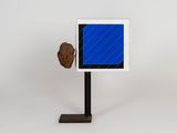 an image of a sculpture of a cookie sitting on top of a table
