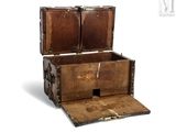an old wooden chest with two open doors