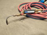a bunch of hoses that are sitting on the floor