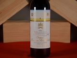 a bottle of wine that is sitting on a table