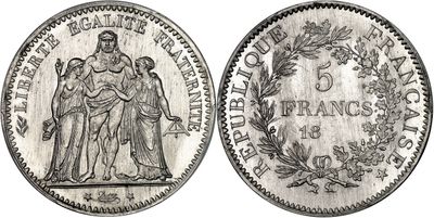 a silver coin with the image of a man and woman on it