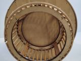 a picture of a wooden basket on a white table