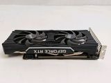 a close up of a video card on a white surface