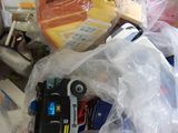 a plastic bag filled with toys and other items