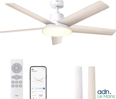 a white ceiling fan with a remote control next to it