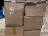a large stack of boxes sitting on top of a pallet