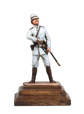 statue of a man in a uniform with a sword on a wooden base