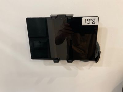 a man taking a picture of himself in the mirror
