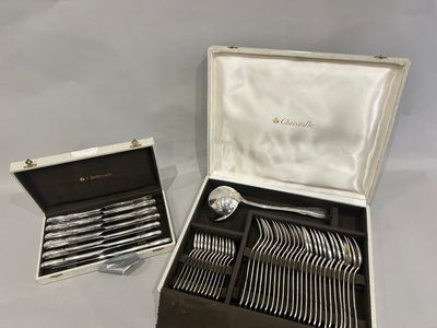 a silverware set in a case with a spoon and fork