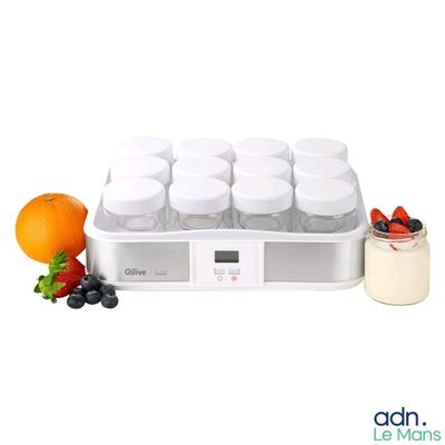 a blender with six jars of fruit and a jar of yogurt