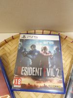 Sony PS 5 : 3 jeux d'occasion dont Marvel Spider-man 2, Resi… (photo 2)