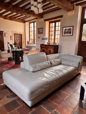 a living room with a couch and a table in it