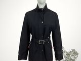 a mannequin wearing a black coat and hat
