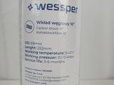 a close up of a bottle of water on a table