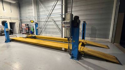 a picture of a garage with a lot of equipment in it