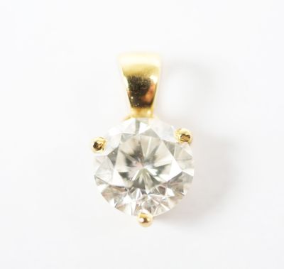 an image of a diamond pendant is shown on a white surface