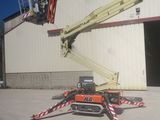 a picture of a man on a cherry picker in front of a building