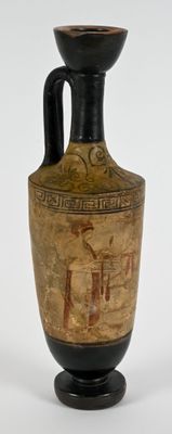 a vase with a painting on it on a stand